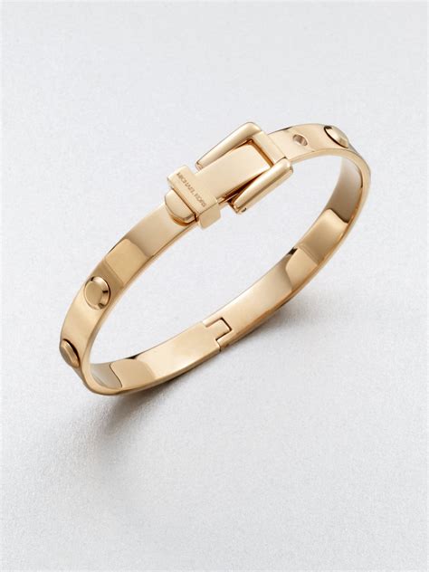 michael kors gold tone buckle bangle|Michael Kors bracelet with diamonds.